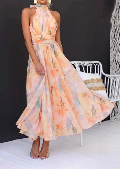 Robe d’été imprimée orange pour femme dos nu à col halter