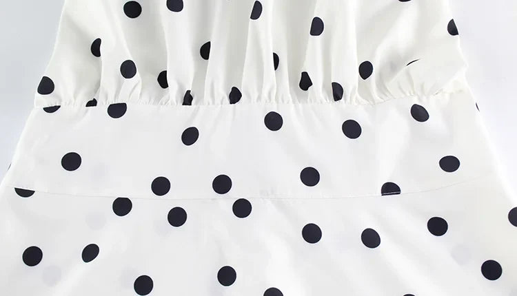 Robe mini à pois blanche et noire