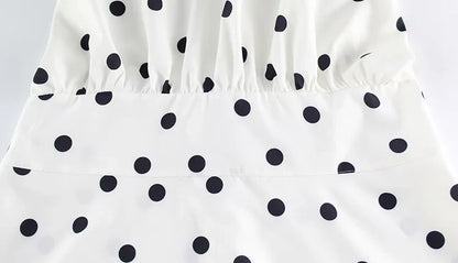 Robe mini à pois blanche et noire