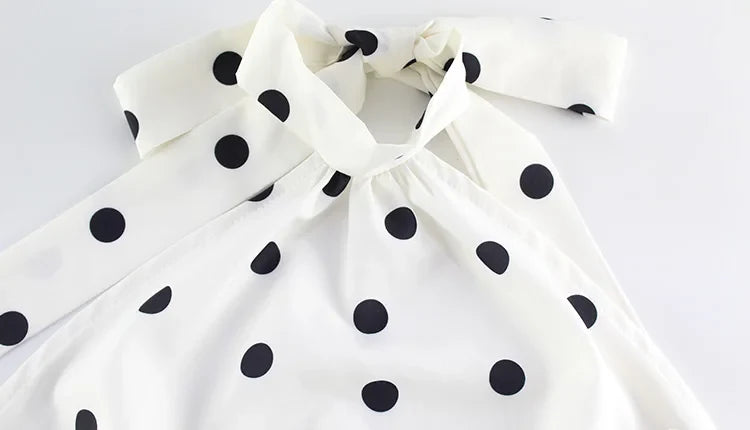 Robe mini à pois blanche et noire