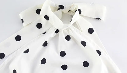 Robe mini à pois blanche et noire