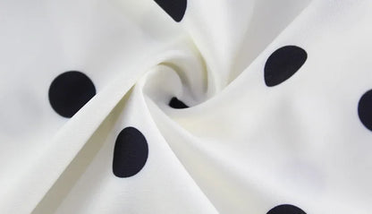 Robe mini à pois blanche et noire