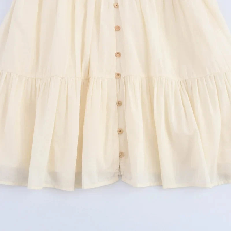 Robe beige bohème brodée