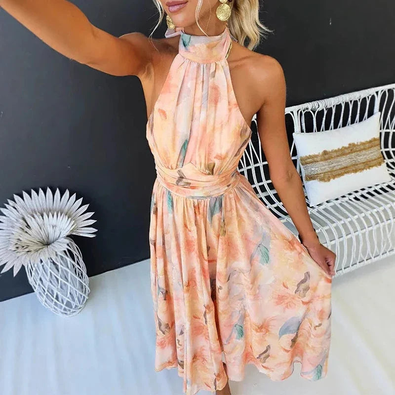 Robe d’été imprimée orange pour femme dos nu à col halter