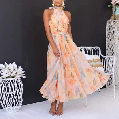 Robe d’été imprimée orange pour femme dos nu à col halter