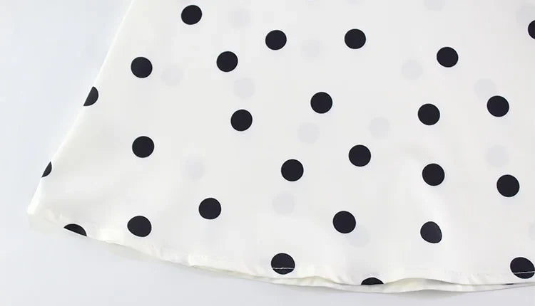 Robe mini à pois blanche et noire