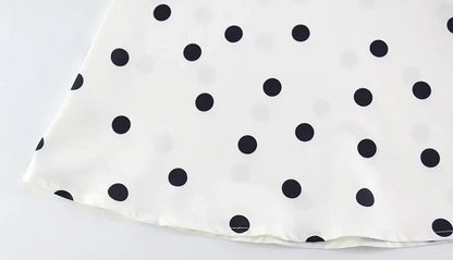 Robe mini à pois blanche et noire