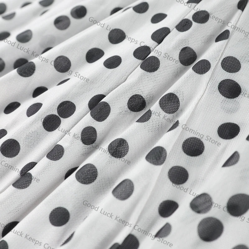 Robe à bretelles à pois chic