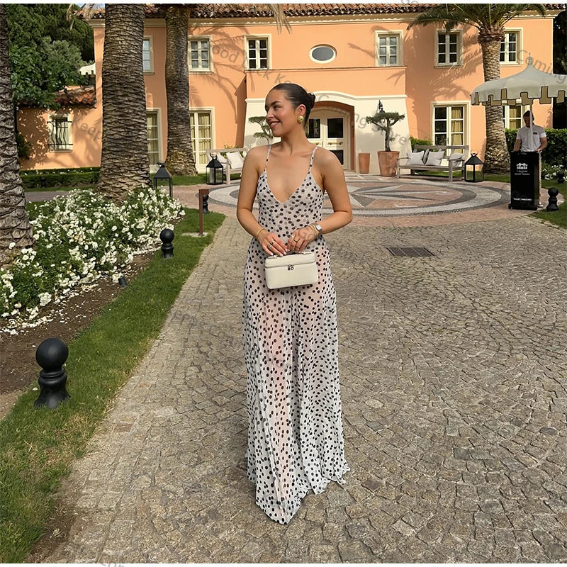 Robe longue blanche à pois noirs