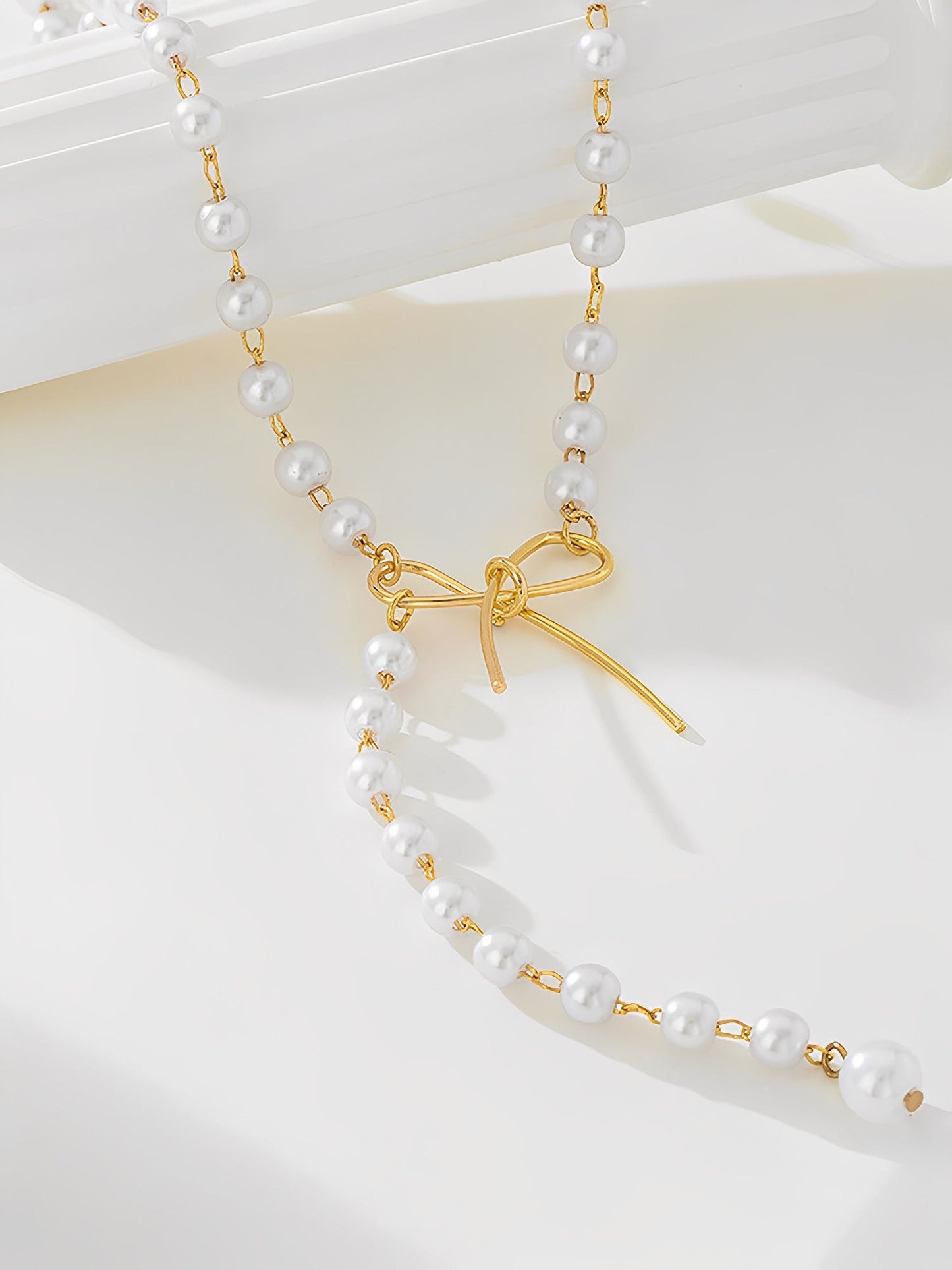Retro Imitation Pearl Alloy Bow Necklace