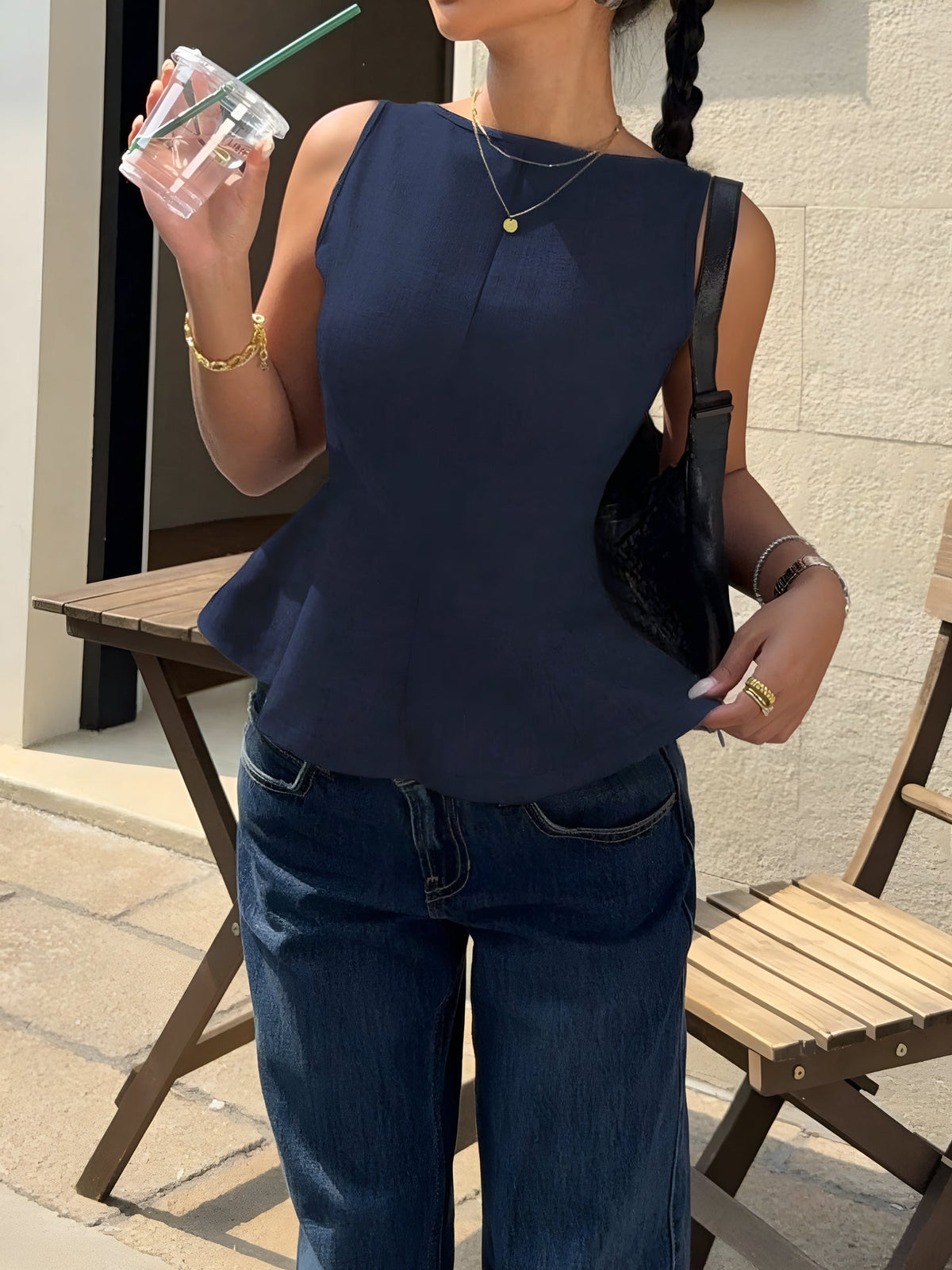 Sleeveless Ruffled Hem Bow Tie Back Blouse