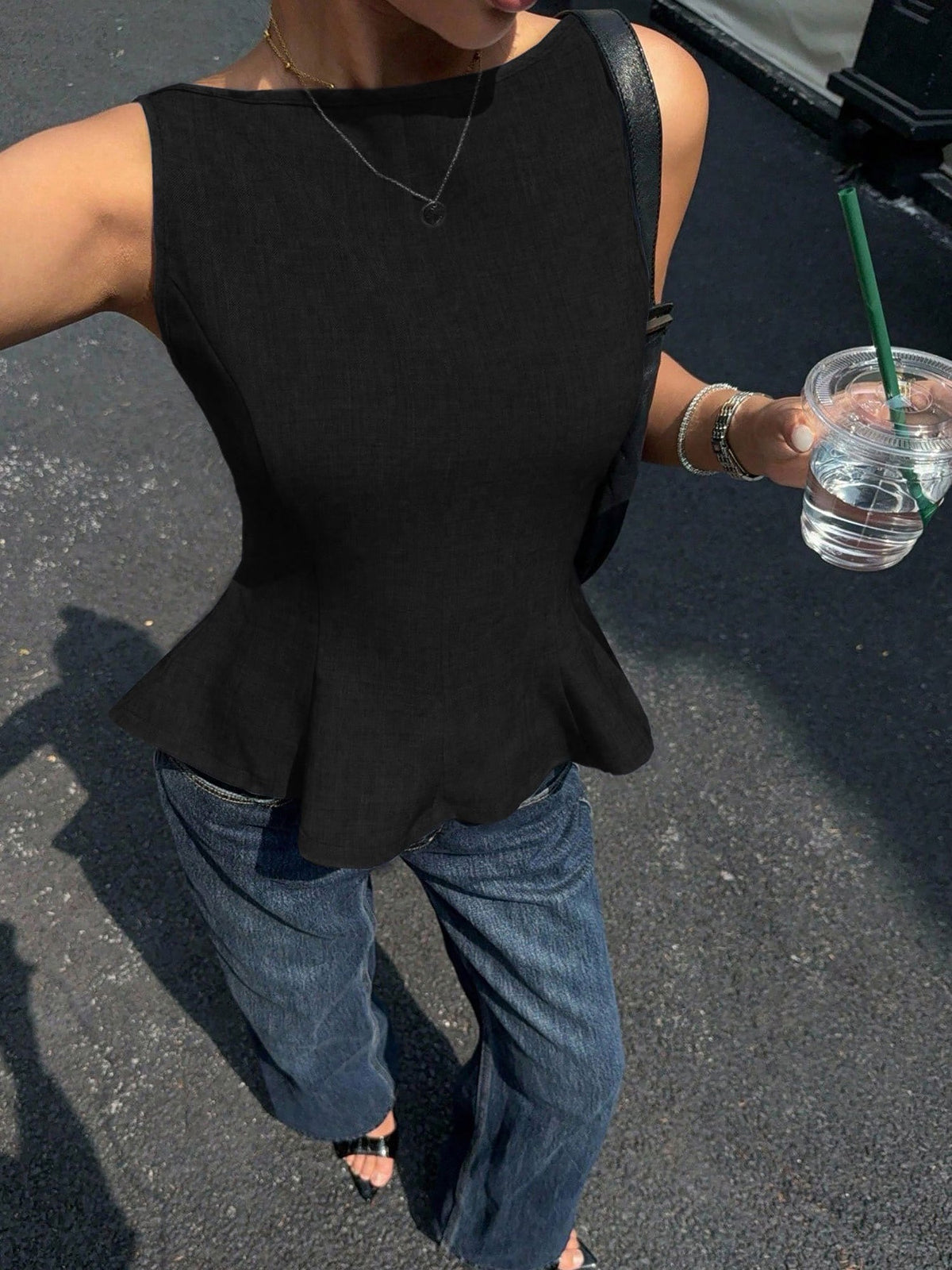 Sleeveless Ruffled Hem Bow Tie Back Blouse
